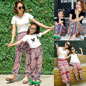 Mẹ mùa hè váy cha mẹ và con nạp bông lụa quần bãi biển nhân tạo cotton silk cây ra hoa Thái in cao eo nữ quần