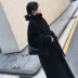 Áo len phổ biến 2018 dành cho nữ màu đen siêu dài trên đầu gối hình chiếc áo khoác len lỏng lẻo Hepburn áo khoác lông cừu Áo khoác dài