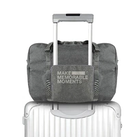 Túi du lịch gấp có thể được đặt xe đẩy trường hợp túi du lịch túi du lịch nữ ánh sáng công suất lớn túi hành lý túi duffel túi túi du lịch kéo