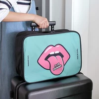 Túi lưu trữ du lịch dễ thương phim hoạt hình xách tay nam và nữ túi nội trú túi lớn có thể được đặt xe đẩy trường hợp quần áo hoàn thành túi lưu trữ ba lô du lịch loại lớn