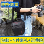 Túi đựng máy ảnh DSLR Túi đeo vai máy ảnh Canon Máy ảnh kỹ thuật số túi ánh sáng cầm tay du lịch tam giác giải phóng mặt bằng - Phụ kiện máy ảnh kỹ thuật số