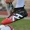 Giày bóng đá nam móng tay dài cỏ nhân tạo AG đinh Messi giúp người lớn tập luyện giày thể thao lining